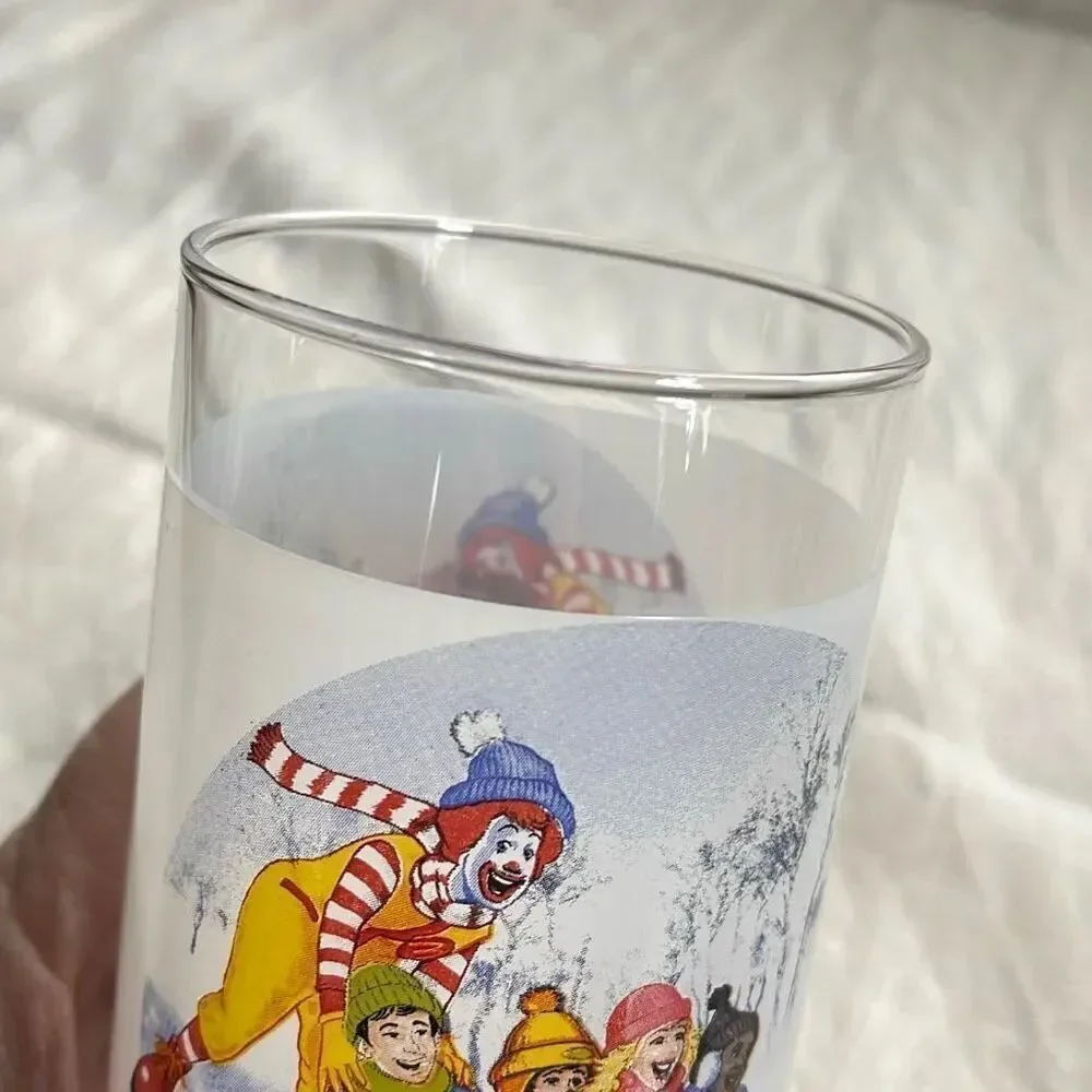 Vintage Ronald McDonald winter sled scene glass.